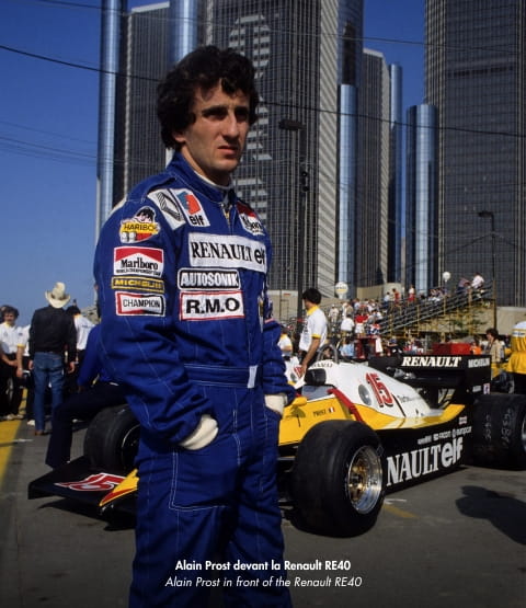 Alain Prost in front of a Renault RE40