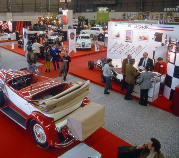 aerial view of the Retromobile show with classic cars and visitors